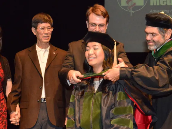 ​​​​​​​Elaine Situ-LaCasse, MD, receiving her medical degree at the Class of 2013 convocation ceremony