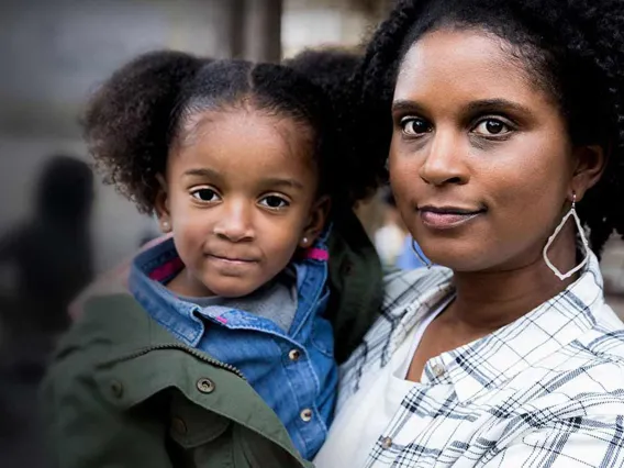 A mother and daughter having photo taken