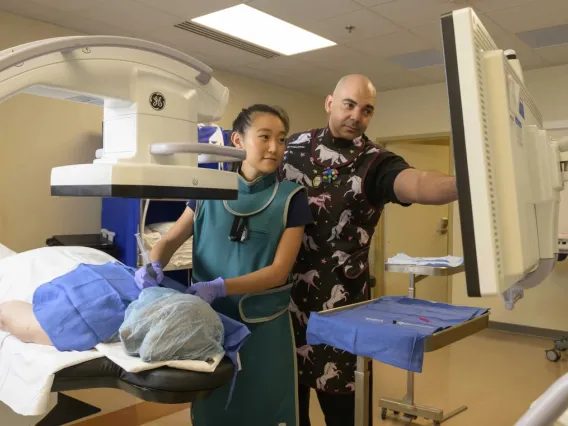 Annie Lee, MD, performed fluoroscopic-guided interventional pain management procedures under the watchful eye of Mohab Ibrahim, MD, PhD, as part of the Pain Fellowship program.