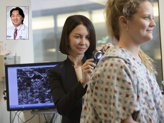 Clara Curiel-Lewandrowski, MD, treating a dermatology patient