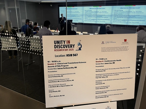 [The day’s dance card for HSIB Room 567, where two morning sessions hosted by Department of Medicine faculty will be held at COM-T Research Day 2025, Pulmonary division Chief Sairam Parthasarathy, MD (in background above), and DOM Chair Jim Liao, MD. ]