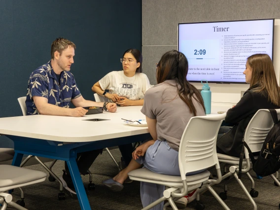 [Erick Brucks, MD, MSc, talks to students about his indirect path to medicine, starting work as a marine biologist and botanist in Hawai'I, before going to medical school, and choosing to work at the Tucson VA Medical Center, where he’s associate program director for the DOM’s Internal Medicine Residency Program in Tucson.]
