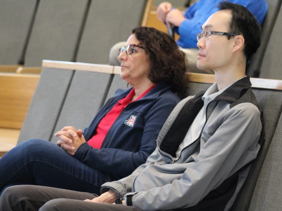 [Fariba Donovan, MD, PhD, a colleague of Dr. John Galgiani at the Valley Fever Center for Excellence, and fellow professor in the Division of Infectious Diseases, listens to his presentation.]