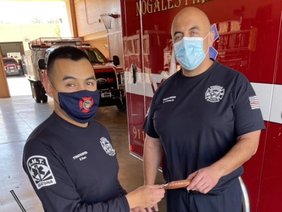 NFD Firefighter EMT Pablo Paez and Firefighter Paramedic German Arana