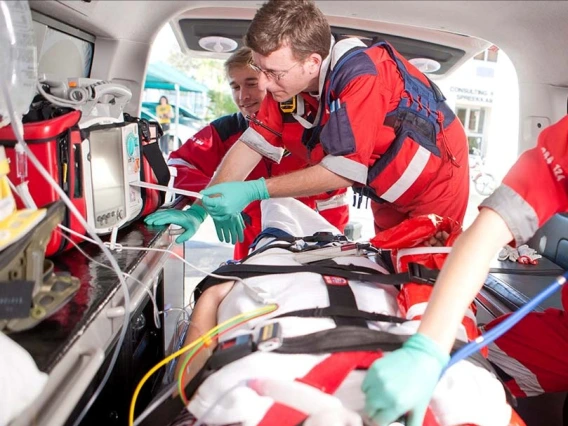 Emergency medical service employees in a EMS truck