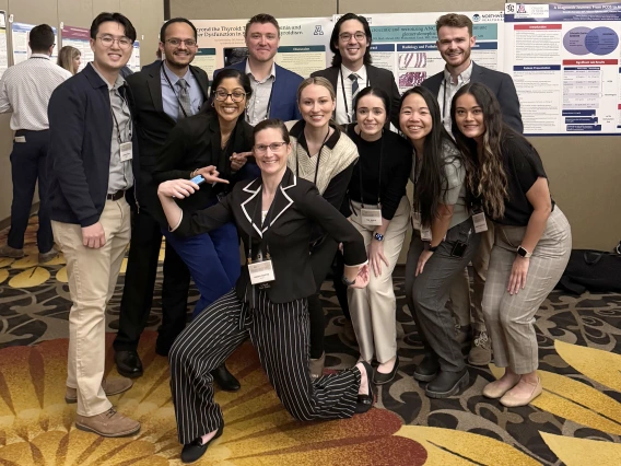 [Internal Medicine residents (PGY2s) with Chief Resident Kandis Boothe in front of ballroom at Casino del Sol Resort in Tucson.]