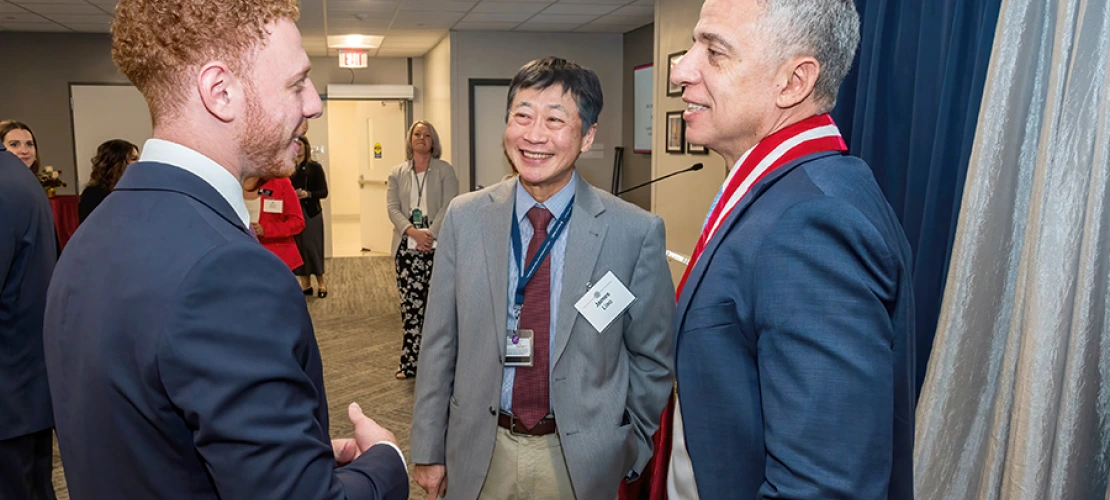James K. Liao, MD, chair, Department of Medicine, shares a lighter moment with Ali Sadek (left), a UT Southwestern medical student and son of Cardiology division chief and Sarver Heart Center director Hesham Sadek, MD, PhD (right).