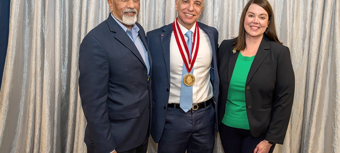 Venkata “Bob” Evani, MD (left), CEO of Banner – University Medical Group and president of Banner Academics, and Allison Flynn Gaffney, FACHE, CEO of Banner – University Medical Center Tucson and South, congratulate College of Medicine – Tucson Cardiology division chief and Sarver Heart Center director Hesham Sadek, MD, PhD, on his investiture.