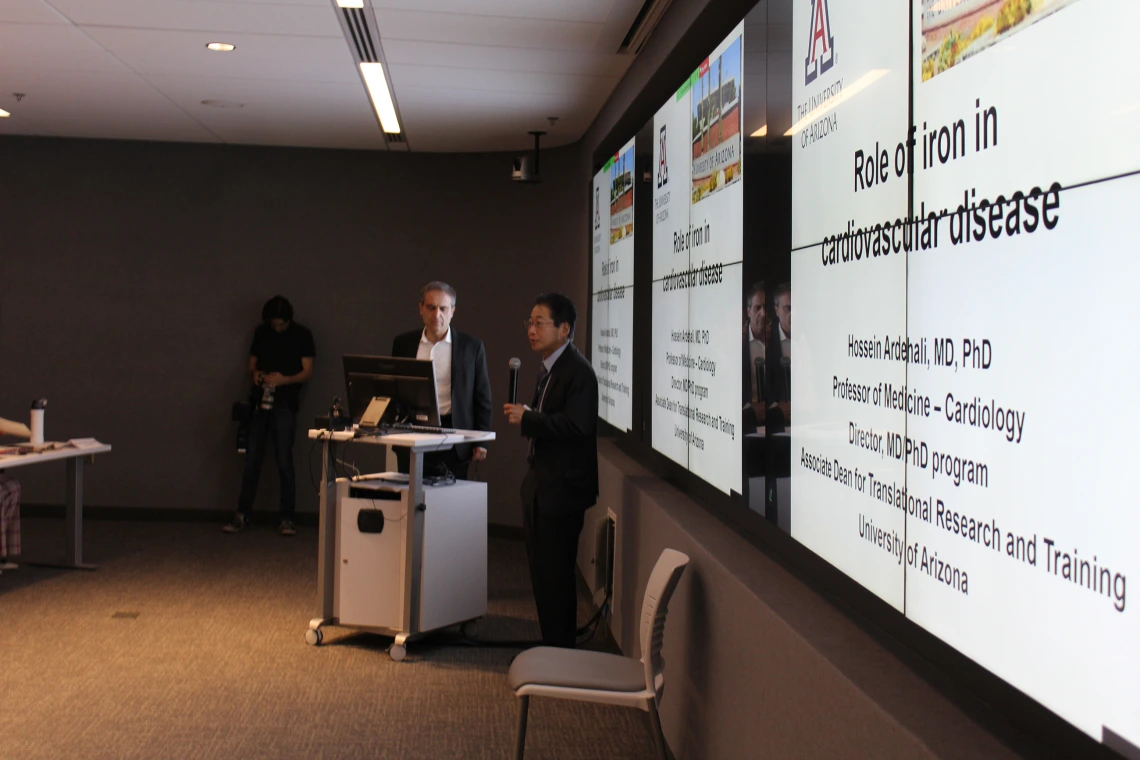 [DOM Chair James Liao, MD, introduces Hossein Ardehali, MD, PhD, who spoke on the “Role of iron and metabolic processes in cardiovascular disease.”]