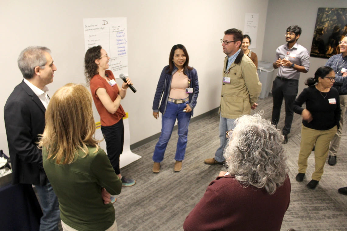 [Splitting up after Dr. Fain’s address into four groups of preferred communication styles, Anna Morenz, MD, MPH, has a laugh as she talks about what the “dominance” group is like.]