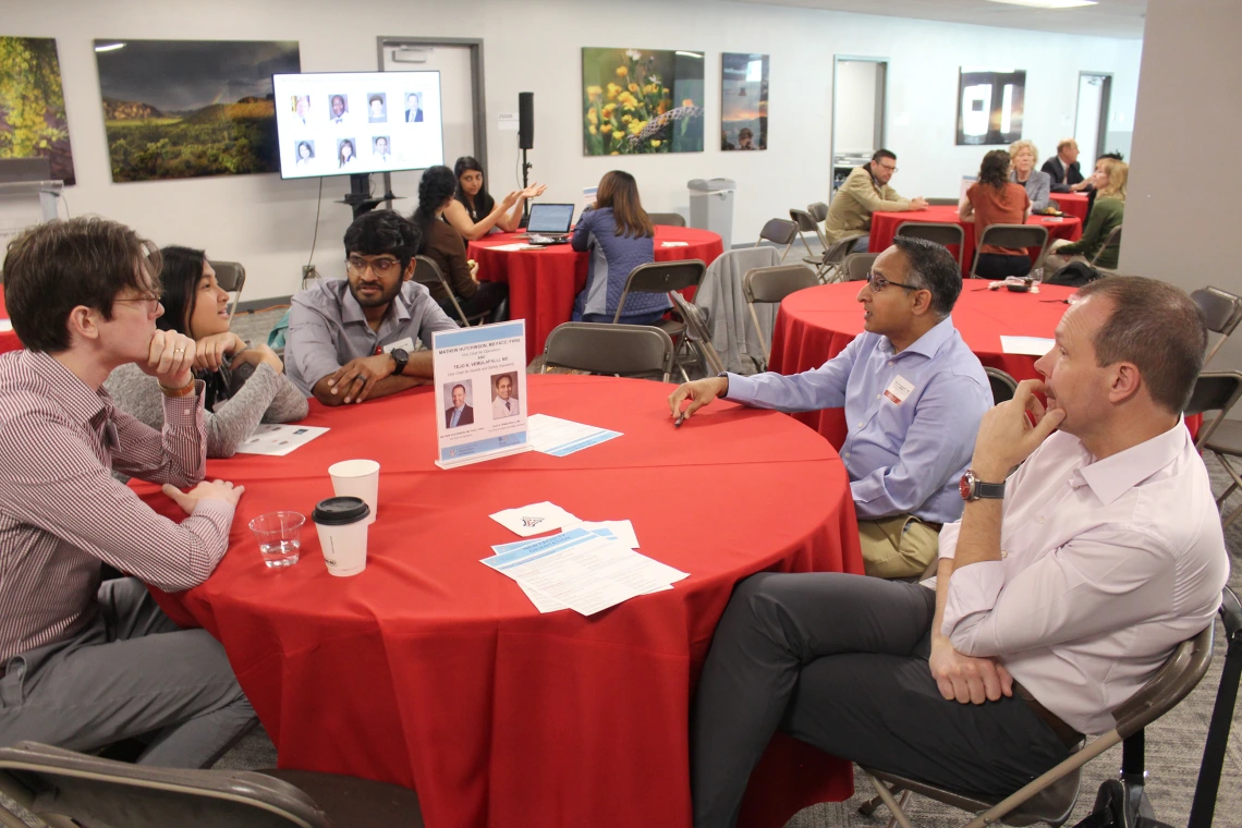 [Mathew Hutchinson, MD (at right), and Tejo Vemulapalli, MD, talk about clinical operations and quality & safety, the vice chair positions they hold in the DOM, with new faculty members Kevin J. Moynahan, MD, Berna Villanueva, MD, and Sooraj Kumar, MD.]