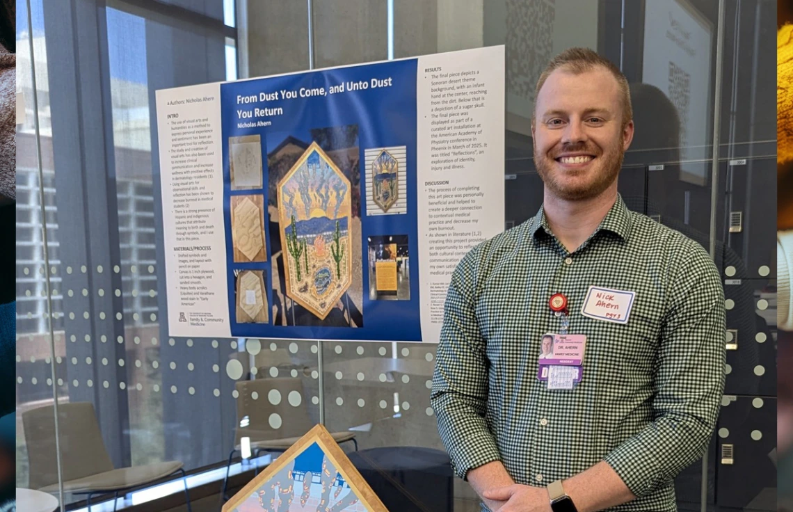 intern with presentation poster