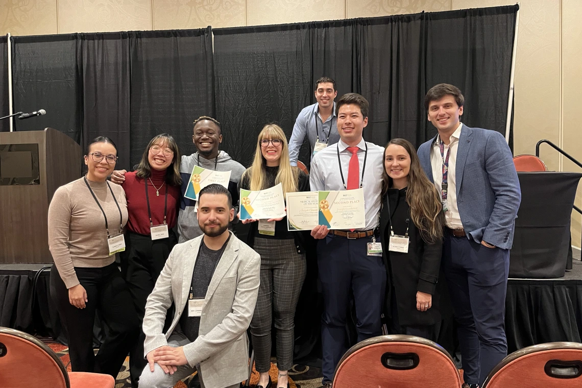 [From left, top row: U of A College of Medicine – Tucson participating students, Iliana Cosio, Laura Tran, Toluwalase Talabi, Hannah Rosch Newton, Joseph Gunderson, Alisia Tumac, and Jacob Ref; front row, kneeling: Ben Litmanovich.]