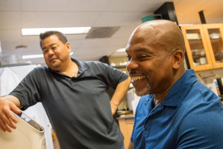 Mark A. Nelson, PhD (right), works with research scientist Marc Oshiro, PhD, who performs DNA amplification in a Thomas D. Boyer Liver Institute laboratory. Mark A. Nelson, PhD (right), works with research scientist Marc Oshiro, PhD, who performs DNA amplification in a Thomas D. Boyer Liver Institute laboratory.