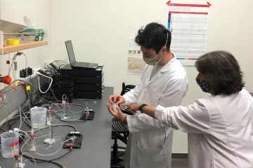 Greg Branigan wants to combine research and patient care to advance brain science and develop new treatments for Alzheimer's disease. Center for Innovation in Brain Science Director Roberta Brinton, PhD, right, works with MD/PhD student Greg Branigan.