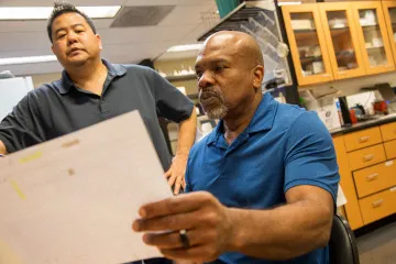 Mark A. Nelson, PhD (right), works with research scientist Marc Oshiro, PhD, who performs DNA amplification in a Thomas D. Boyer Liver Institute laboratory. Mark A. Nelson, PhD (right), works with research scientist Marc Oshiro, PhD, who performs DNA amplification in a Thomas D. Boyer Liver Institute laboratory.