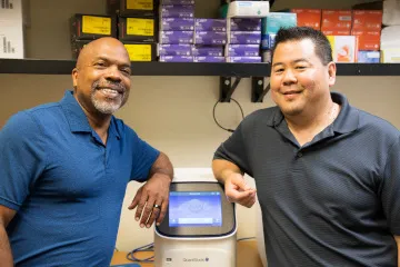 Mark A. Nelson, PhD (right), works with research scientist Marc Oshiro, PhD, who performs DNA amplification in a Thomas D. Boyer Liver Institute laboratory. Mark A. Nelson, PhD (right), works with research scientist Marc Oshiro, PhD, who performs DNA amplification in a Thomas D. Boyer Liver Institute laboratory.