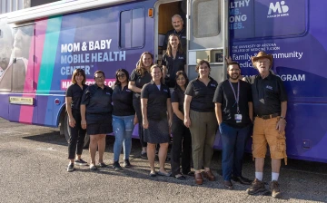 Mobile Health team in front of mobile clinic