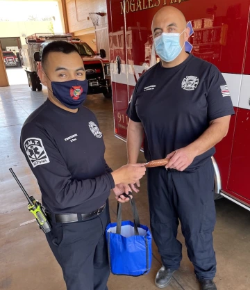 NFD Firefighter EMT Pablo Paez and Firefighter Paramedic German Arana